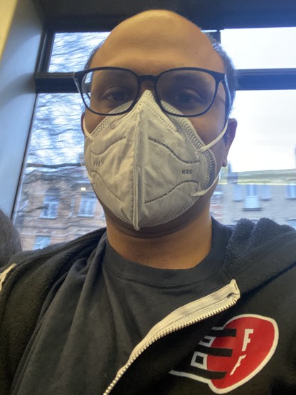 Kushal wearing a mask and EFF hoodie.